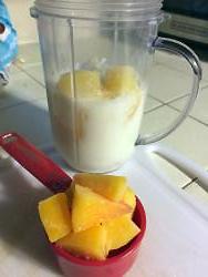 Add 1/4 cup peaches. Blend all ingredients. Enjoy!