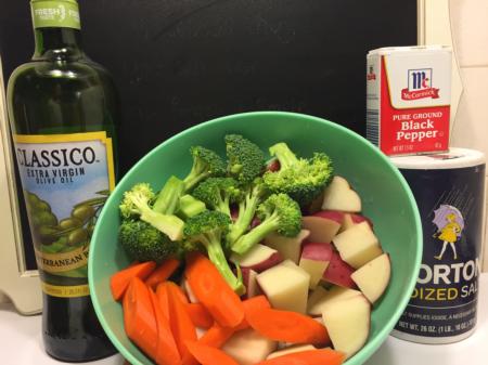 Chopped carrots, potatoes, broccoli, olive oil, salt, and pepper