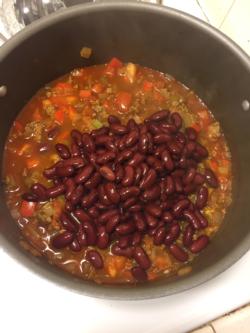 Add in kidney beans. Simmer for 10 minutes. Stir occasionally.
