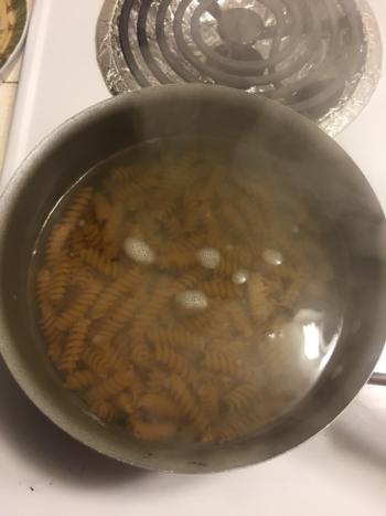 Boil 1/2 a box of pasta.