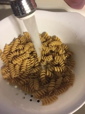 Rinse pasta with cold water.