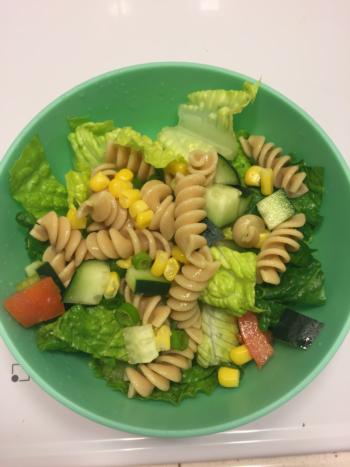 Romain lettuce topped with 1/2 cup pasta salad.