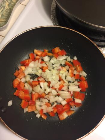 Add bell peppers and onions.