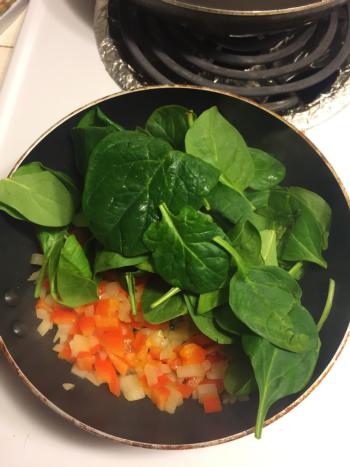 Add spinach and cook until shrunken. Season with salt and pepper.