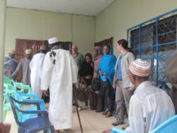 Preparing to meet chief and village elders, Comoros