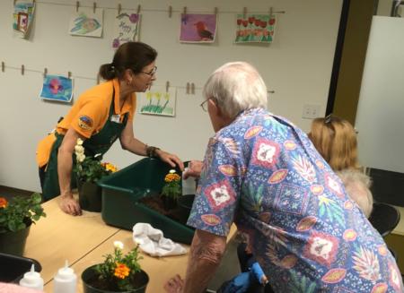 Master Gardeners bring the outside inside with a hands-on gardening activity at Alzheimer's San Diego