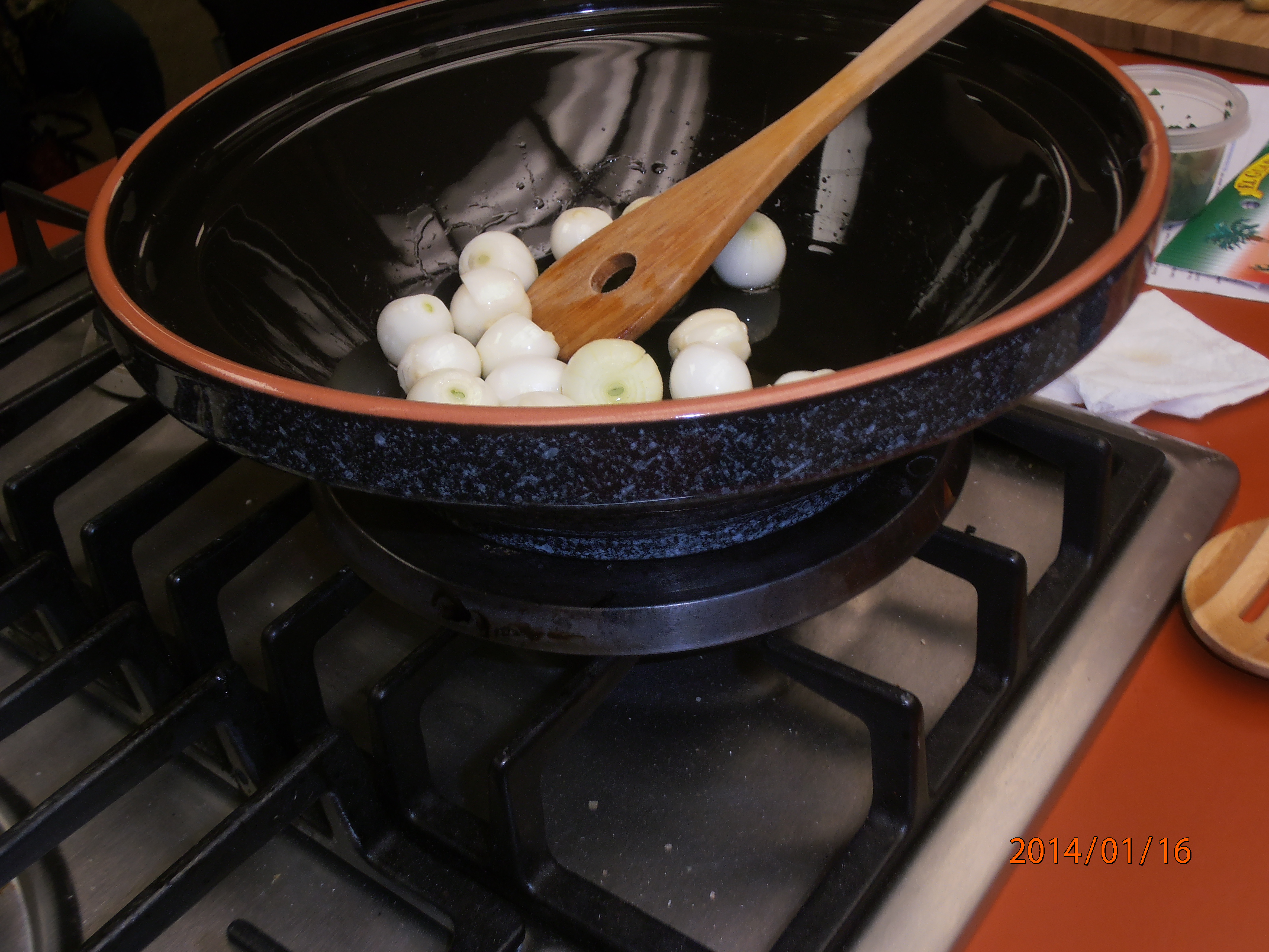 Sauteeing pearl onions in tagine