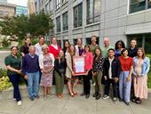 The California Legislature honored the Nutrition Policy Institute for the impact of its decade of research. Dani Lee and Lorrene Ritchie hold the framed document.