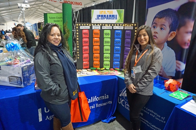 Teresa Rios-Spicer, left, and Yesenia Medrano challenged visitors to test their nutrition knowledge at Healthy Jeopardy!