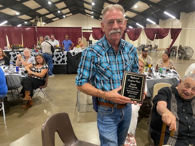 John Harper receives Agriculturalist of the Year Award. Photo by Glen McGourty