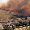 Communities in fire-prone areas can be retrofitted to better withstand wildfire, says .Max Moritz, UC Cooperative Extension statewide wildfire specialist .