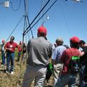 University of Nebraska's Suat Irmak, facing camera, explains how a high-technology weather station in Nebraska continuously monitors crop evapotraspiration and crop coefficients during the growing season. Irmak presents the keynote address to California farmers Sept. 12.