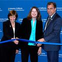 From left, California Department of Food and Agriculture secretary Karen Ross, UC ANR VP Barbara Allen-Diaz and Davis Mayor Joe Krovoza cut the ribbon to new building.