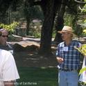 UCCE advisor Chuck Ingels, right, discusses tree pests. UC seeks comments on proposed UCCE positions.