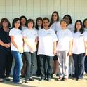 UCCE Riverside staff gather for a photo wearing their centennial t-shirts. Back row, left to right: Ihab Sharabeen, Claudia Diaz-Carrasco, Eva Parrill, Alyssa Taylor, Vada Wright, Claudia Carlos. Front row, left to right: Mao Vue, Cheryl Eggleston, Emma Sandoval, Connie Costello, Eta Takele, Chutima Ganthavorn, Chung Huynh, Myriam Acevedo.