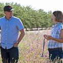 UCCE advisor Rachael Long, left, talks with a Yolo County grower about hedgerows. UCCE advisors serve Californians in one or more counties.