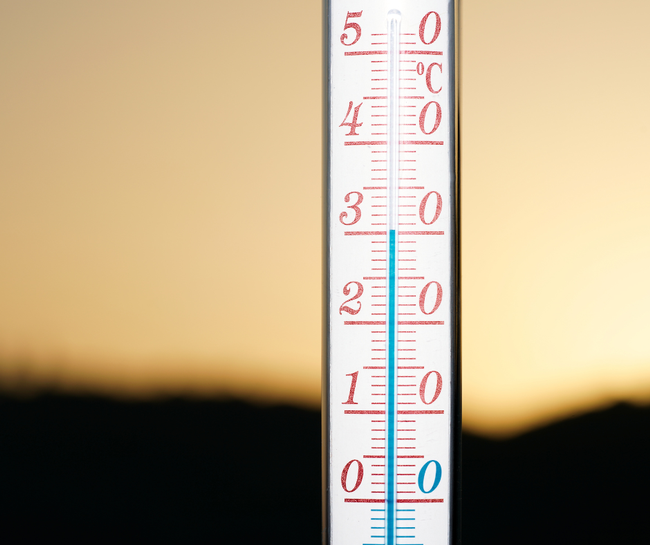 A thermometer indicates rising temperatures
