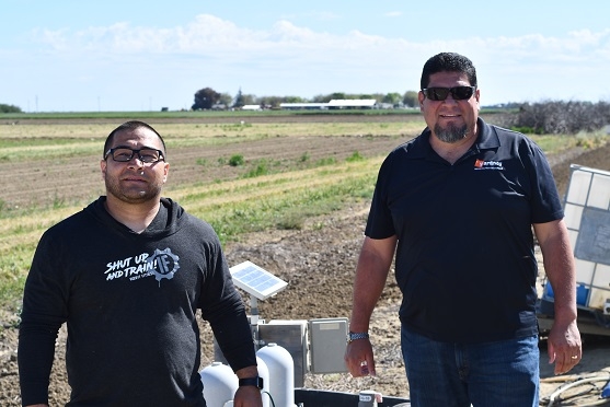 Moises Luna (left) of Agrivalley Company and Alex Flores of Yardney Water Filtration Systems visit the NRI Project field in Five Points, CA April 2, 2019