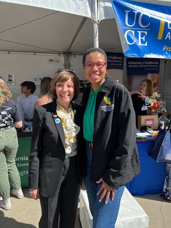 CDFA Secretary Karen Ross standing with Eve at Ag Day at the Capitol.