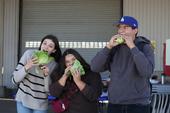 Students from Fullerton Joint Union High School, including Andres Martinez (right), snack on lettuce grown in hydroponics at the South Coast REC. Photo by Saoimanu Sope.