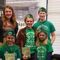 Author Kiera Butler poses at a book store in Corte Madera with 4-H members.