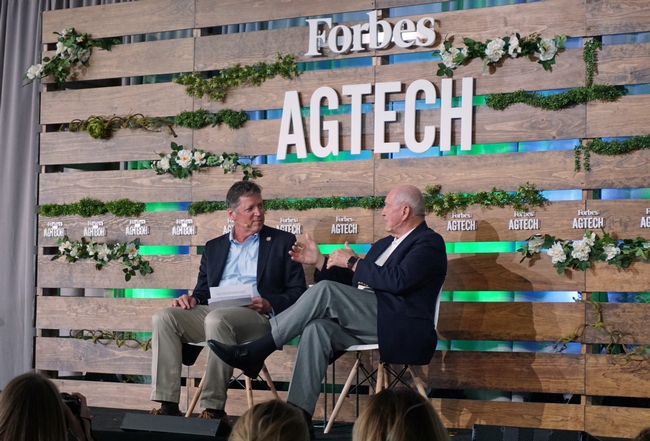 US Secretary of Agriculture Sonny Perdue speaks with Forbes CEO Mike Federle at the Forbes AgTech Summit in Salinas.