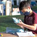 Fifth-grader Sarp Akalin designs and builds a battery-powered motorboat for Engineers Week. All photos by Evett Kilmartin