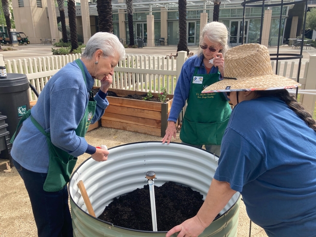 San Diego County Master Gardeners work in the demo garden