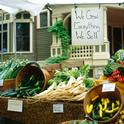 A display at a Portland Oregon farmers' market gives a sense of abundance.