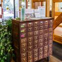 A vintage oak card catalog houses the seed library in the Clovis public library. (All photos: Sarah del Pozo)