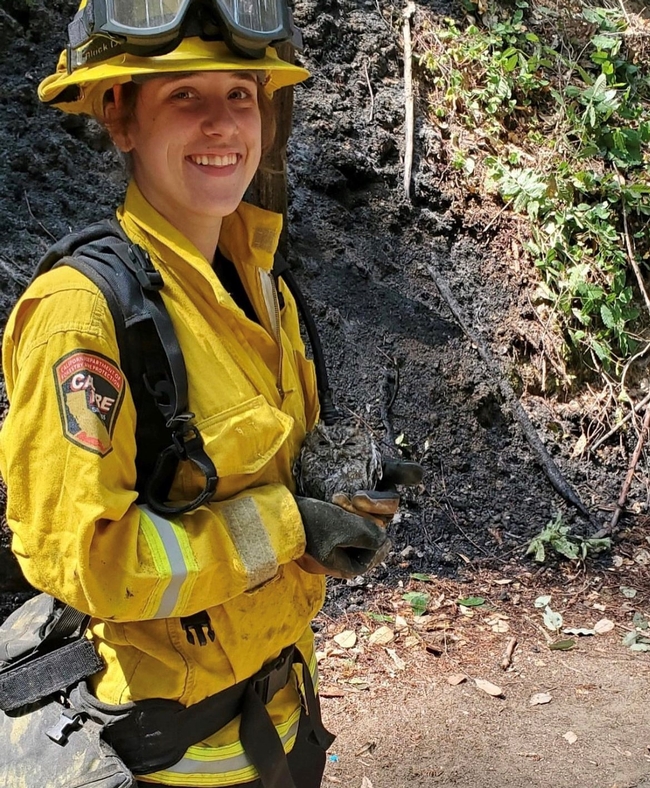 Lindsay Jackson in her yellow CAL FIRE firefighter uniform