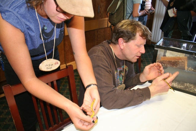 Naturalists with legless lizards at the California Naturalist statewide conference.