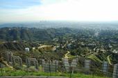 A hike to the Hollywood sign lends a far-off view of downtown beyond Griffith Park.