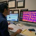 UCCE ag engineer Ali Pourreza views the virtual orchard on his computer.