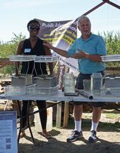 UCCE climate-smart educator Esther Mosase, left, and UCCE specialist Jeff Mitchell at a field day.