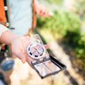 A compass is one of the tools professional foresters use to establish plots when collecting data about a forest.