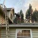 Don't forget to clean your roofs and gutters of any moss, vegetative debris, or leaf litter. Here the author wishes he did this in May rather than waiting until August with wildfire smoke looming in the background.