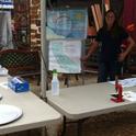 Lauren Martinez sets up water education booth