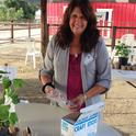 Master Gardener (MG) Elaine Pepe-Williams prepares Plant-a-Seed Center