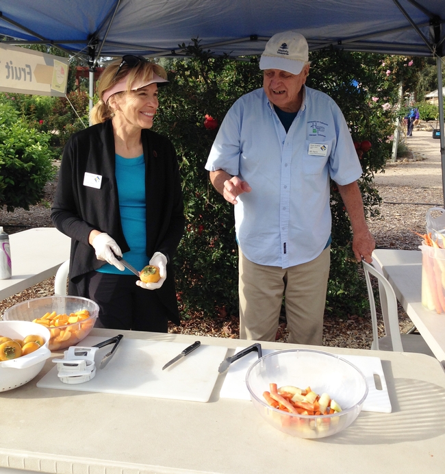 MG Candis Hong and Bill Harris at fruit and vegetable tasting center
