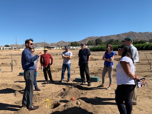 Amir Haghverdi showing plots to EarthWatch, UCCE and CBWCD teams