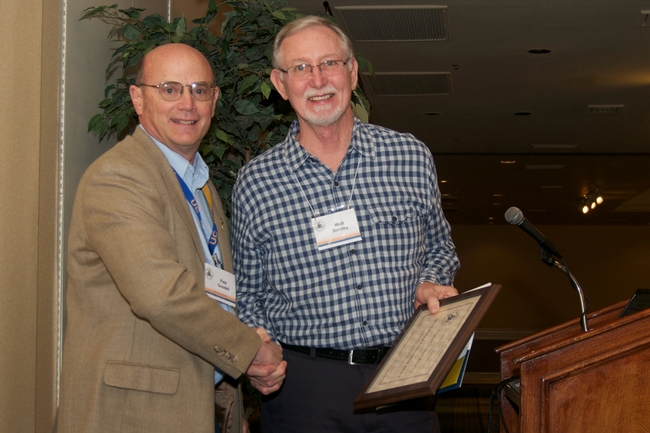 AAIE president Pete Goodell (left) presented Walt Bentley (right) the Lifetime Achievement Award.