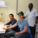 Left to right, interns Lucas Bartolón and Kenia Ruiz with Herve Avenot, an assistant project scientist working in the Michailides lab.
