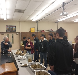 Jeff Mitchell teaching students about the importance of soil productivity and conservation agriculture strategies.