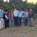 Jay Brunner (far left), Walter Bentley and Armando Hernandez (center), with family members from one of the Guatemalan farms visited in April, 2016.