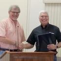 It's all smiles as Director Jeff Dahlberg congratulates David Grantz on his retirement after 29 years.