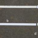 Figure 2. Components needed to build a tensiometer: a. ceramic cup, b. ½ inch PVC pipe for shafts, c. PVC “T”, d. vacuum gauge, and e. rubber stopper.