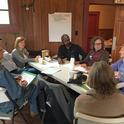 Community members meet at food policy summit in 2017.