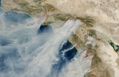 Dry, northeasterly winds come in the fall and the winter, often through mountain ranges, which fuels wildfires in Southern California – a different pattern than summertime fires. (Photo: NASA)