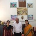 (left to right) Devii Rao, Dr. K. Satyanarayan and Dr. Jagadeeswary at the Veterinary University in Bengaluru with beautiful scenes of agricultural life depicted above us on the wall. Photo credit: Daniel George.